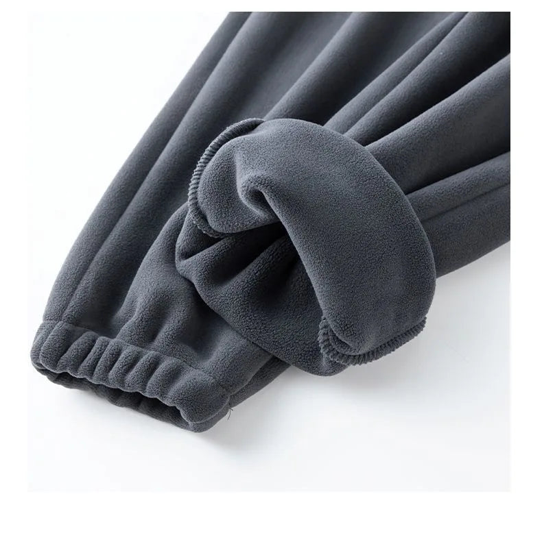 Pantalones para hombres con forro de felpa, para invierno, gruesos, duraderos, con puños, moda juvenil, ajuste suelto, talle medio-alto, pantalones largos